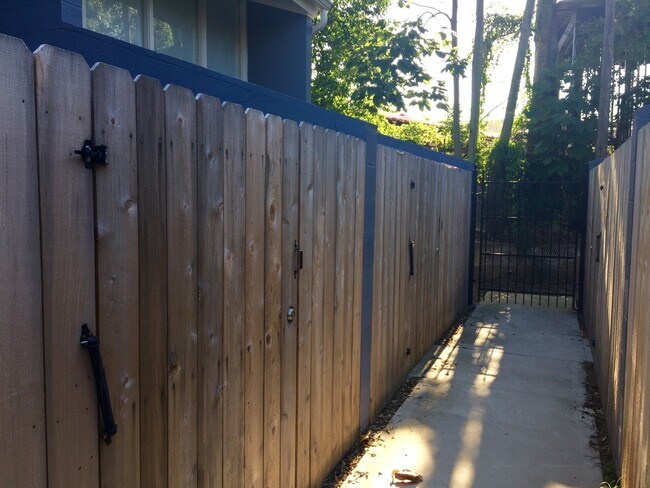 Wooden gates for entry to each unit - 3350 Tula St