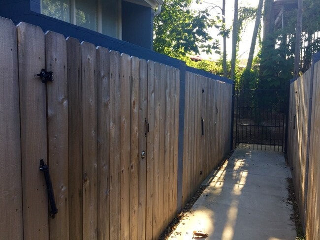 Wooden gates for entry to each unit - 3350 Tula St