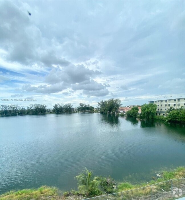 Building Photo - 9911 W Okeechobee Rd