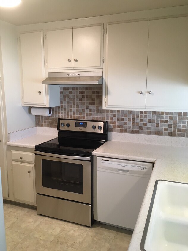 Kitchen with new ss stove/oven - 1187 E 3rd St