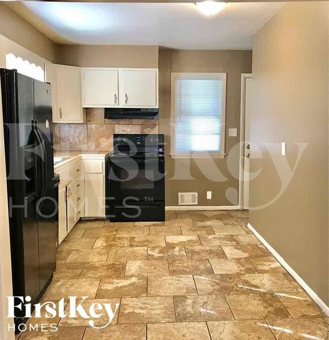 Foto del edificio - 7615 E 48th St