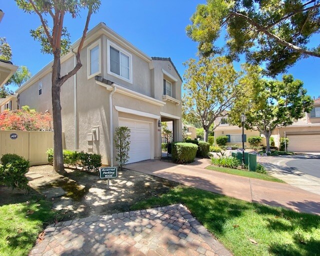 Exterior - Garage plus extra assigned parking space - 11235 Carmel Creek Rd