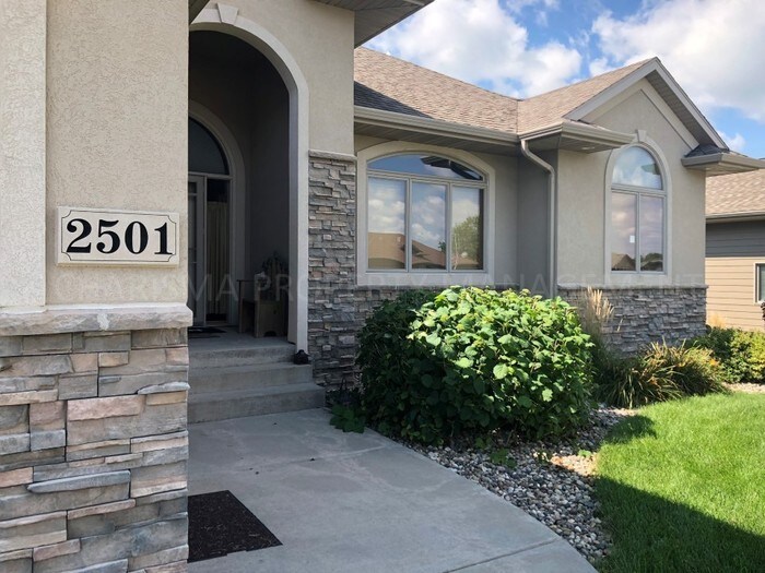 Primary Photo - Spacious and Amenity 5 Bedroom, 3 Bath Home