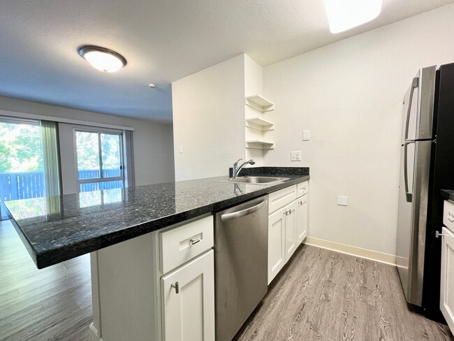 Building Photo - Renovated Pet-Friendly STUDIO with Full Ki...