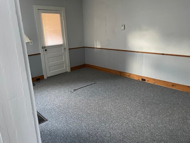 Living room facing front door - 450 3rd Ave