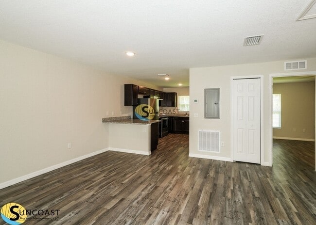 Building Photo - 9432 N Manashee Dr