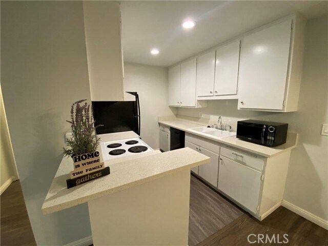 Foto del edificio - 424 N Bellflower Blvd