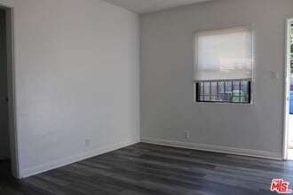 Building Photo - 6340 10th Ave
