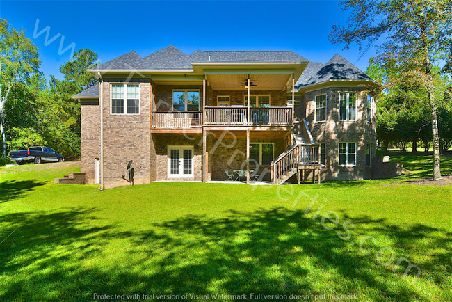 Building Photo - Stunning 5 BR Brick Home on Lake Carolina