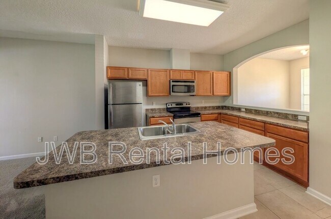 Foto del edificio - 4220 Plantation Oaks Blvd