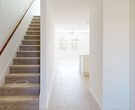This contemporary 2000 square foot residence in Montgomery, TX offers a harmonious blend of comfort and functionality across two well-designed floors. The home features four bedrooms, including a generous 200 square foot primary suite, and three full bathrooms, providing ample space for family living or entertaining guests.

The heart of the home is a modern kitchen, showcasing sleek white cabinetry, stainless steel appliances, and a convenient island with a sink. The kitchen's open concept seamlessly connects to the living area, creating an ideal space for both daily life and social gatherings.

Throughout the home, large windows allow natural light to flood the rooms, enhancing the sense of spaciousness. The bedrooms are well-proportioned, with plush carpeting for comfort underfoot. Closet space is abundant, with three dedicated closet areas ensuring excellent storage options.

The bathrooms are designed with contemporary fixtures and finishes, featuring clean lines and a bright, airy feel. Light-colored wood flooring in some areas adds warmth and complements the overall neutral color palette.

With its thoughtful layout and modern amenities, this home at 1734 Fennel Flower offers a perfect balance of style and practicality for comfortable living in Montgomery, Texas.
