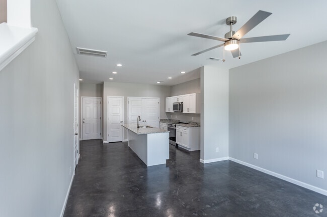 3BR, 2.5BA - 1100SF - Living Room - Caney Commons