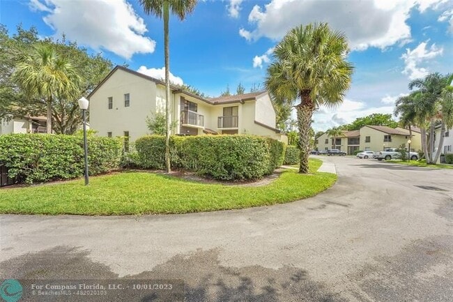 Building Photo - 3655 Cocoplum Cir