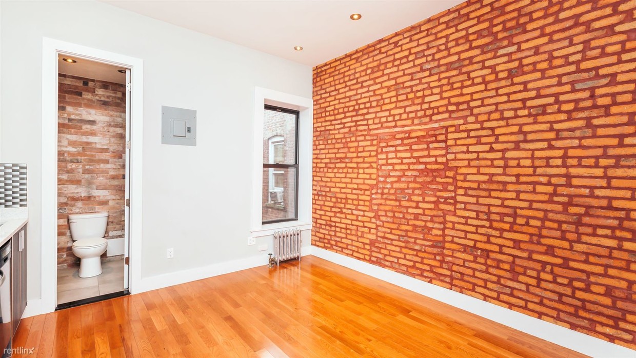 Building Photo - 61-36 Woodbine St