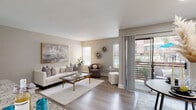 This well-appointed single-floor residence offers a thoughtfully designed layout that balances comfort and contemporary style throughout. The living room serves as the heart of the home, bathed in natural light from multiple windows fitted with white blinds. Light wood-tone flooring flows seamlessly across the space, complementing the warm neutral wall tones. A sliding glass door opens directly onto a private balcony, extending the living area outdoors and bringing in additional light and views.

The kitchen is outfitted with crisp white shaker cabinetry, granite countertops, a herringbone tile backsplash, and stainless steel appliances, creating a clean and functional workspace. Adjacent to the kitchen, the dining area features a sliding glass door to the outdoors and is framed by built-in shelving, adding both storage and character.

Both bedrooms are calm and comfortable retreats, each featuring ceiling fans, soft neutral walls, light wood flooring, and windows that allow ample natural light. The bathroom is finished with large-format tile in the tub surround, granite countertops, and light wood flooring, maintaining the cohesive aesthetic found throughout the residence. Every room reflects a carefully curated, serene design sensibility.