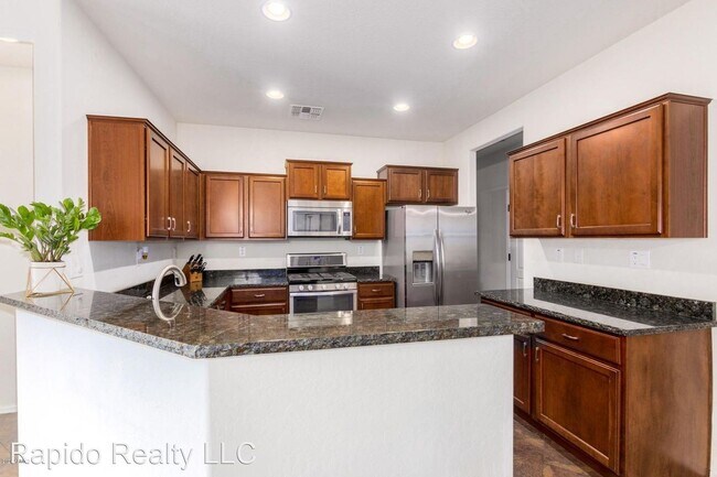 Building Photo - 3 br, 2 bath House - 10811 W El Cortez Pl