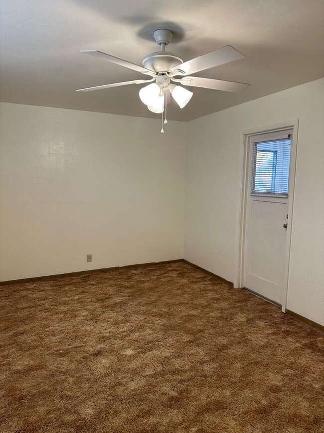 Building Photo - Available Now! Large Backyard