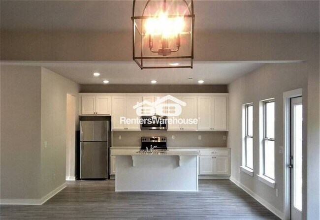 Foto del edificio - Discover modern living in the 4 bedroom 2 1/2 bath home