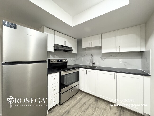 Photo du bâtiment - Cozy 1-Bedroom Basement Apartment with Backyard & Parking in Brampton