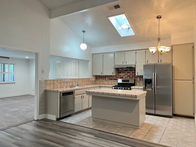 Building Photo - Spacious Four Bedroom Three Bathroom Home