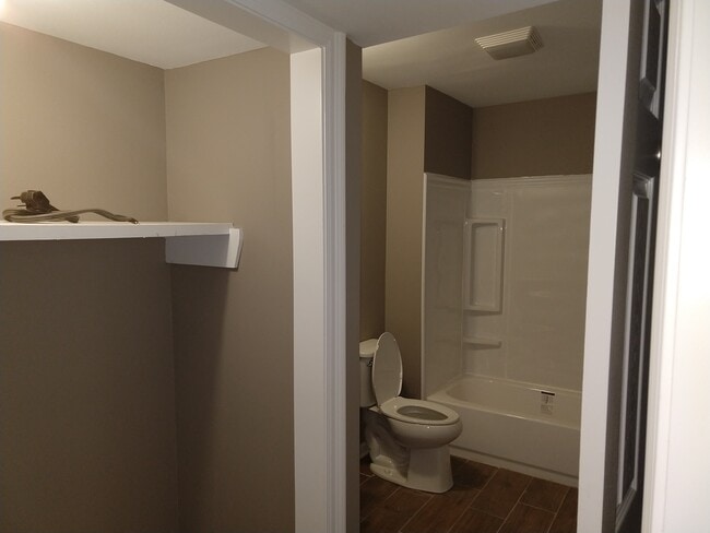 Downstairs master bath and washer/dryer hookups. - 3129 O'Neal Ln