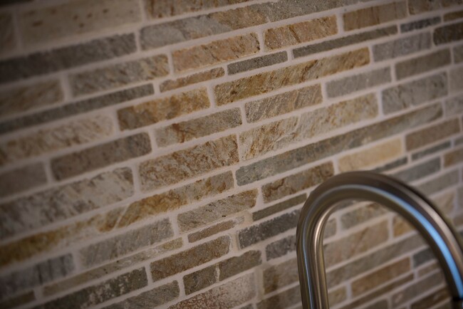 Kitchen sink with brick backsplash - The Alexan