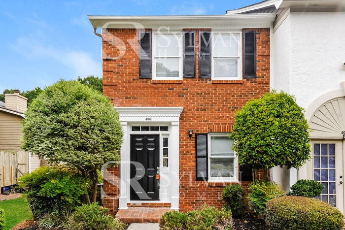 Primary Photo - Charming 2BR Brick Haven Awaits You