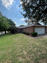 Building Photo - 7601-7603 Silveridge Dr