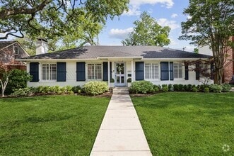 Building Photo - 6505 Woodland Dr