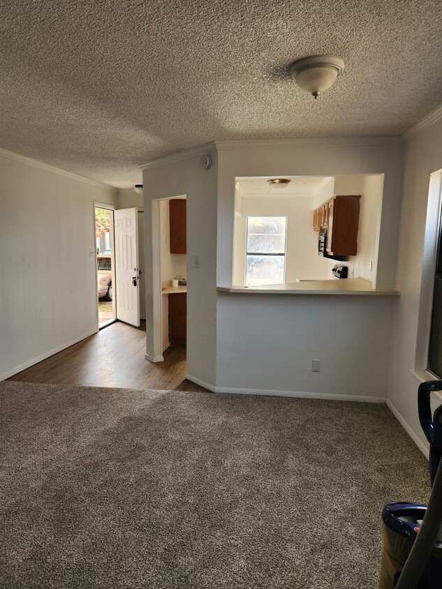 Entry and eat in Kitchen. Dishwasher, Range, Microwave, Washer dryer hookups, - 7408 Avenue X