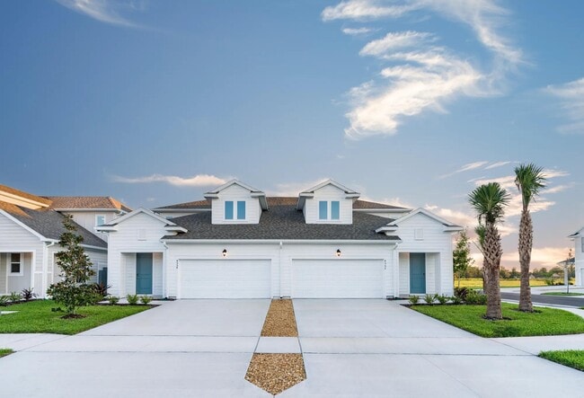 Las casas dúplex amplias y luminosas de Amavi Kissimmee ofrecen un entorno acogedor con mucho espacio para relajarse. - Amavi Kissimmee