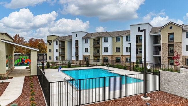 Building Photo - Gardens at Bella Breeze