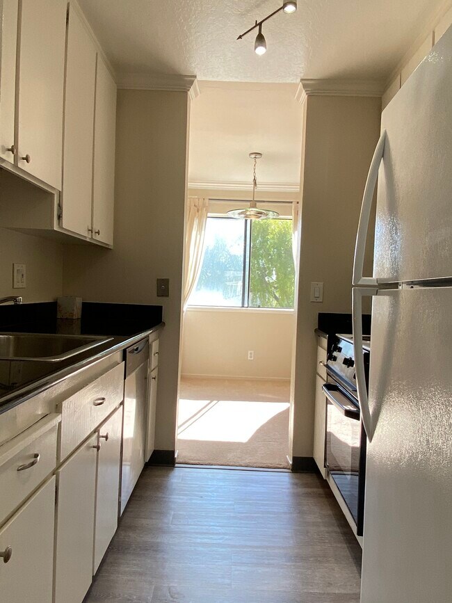 Kitchen with View of Dining Room - 777 San Antonio Rd