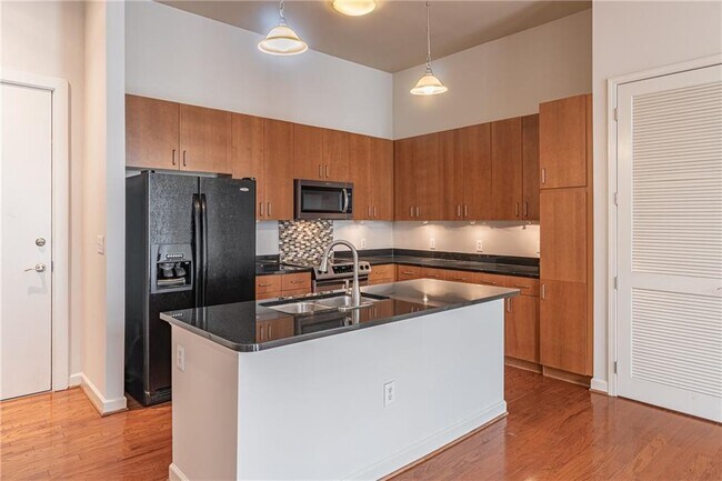 Building Photo - 711 Cosmopolitan Dr NE