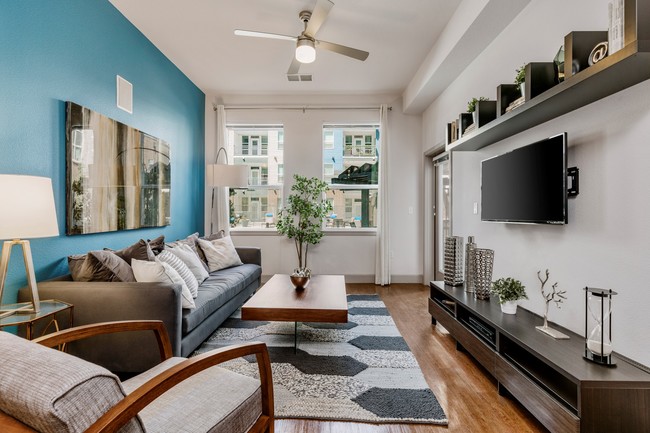 City House Apartments Model Living Room and Window - City House Apartments