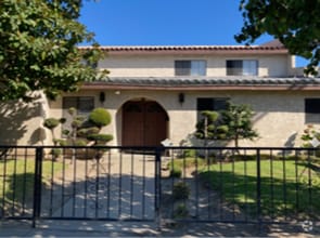Building Photo - 14730 S Normandie Ave