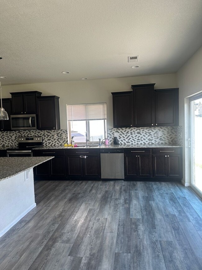 Photo - Great 2-story with a 3-car garage Available NOW! House