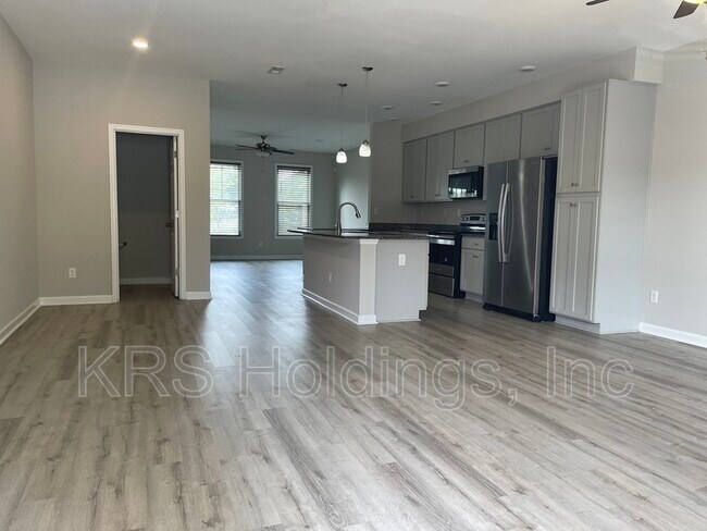 Building Photo - 8218 Tidewater Dr