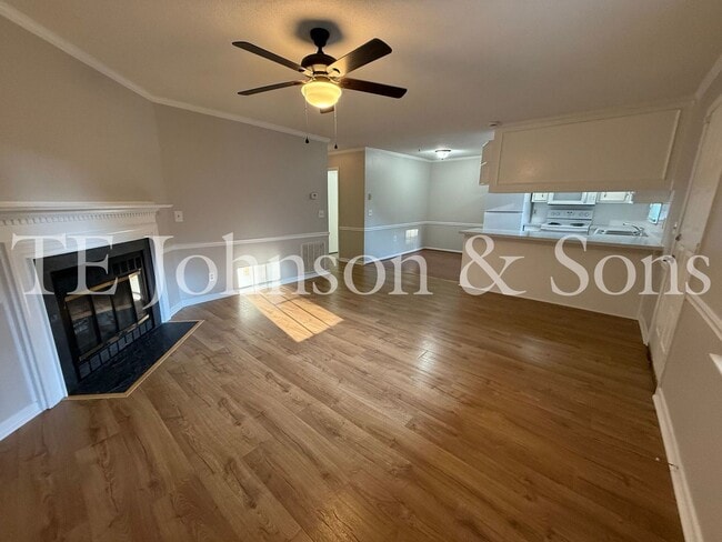 Building Photo - Charming 2-Bedroom with Fireplace & Modern...