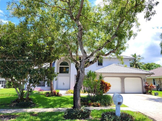 Foto del edificio - 4 br, 3.5 bath House - 9631 NW 39th St