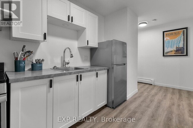 Building Photo - 4595 Queen St