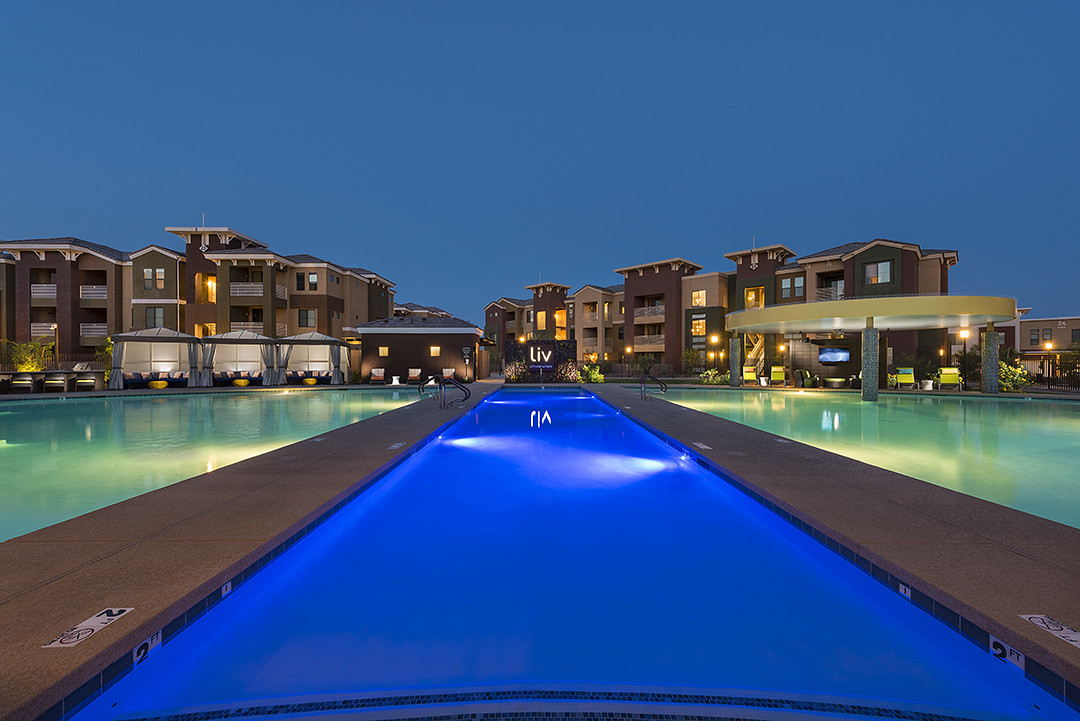 Relax and unwind at one of our resort-inspired heated pools. - Liv Ahwatukee