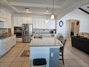 Building Photo - 5768 NW Zenith Dr