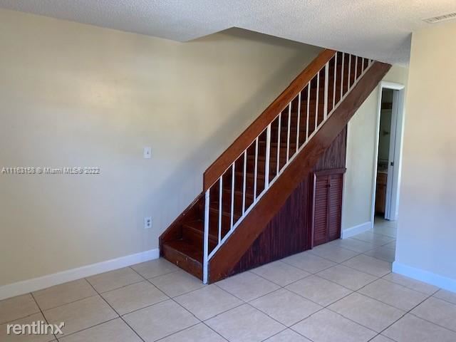 Building Photo - 2 br, 1.5 bath Townhome - 13270 SW 58th Te...