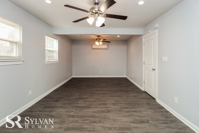Building Photo - Enjoy easy living in this charming 4BR 2.5...