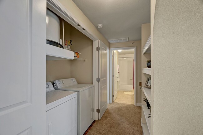Tuscany at Faudree in Unit Washer and Dryer with Built in Storage - Tuscany at Faudree