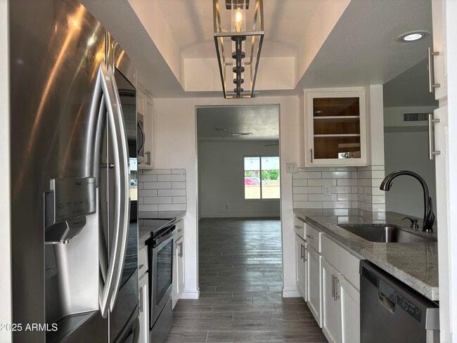 Building Photo - 4410 S Rita Ln