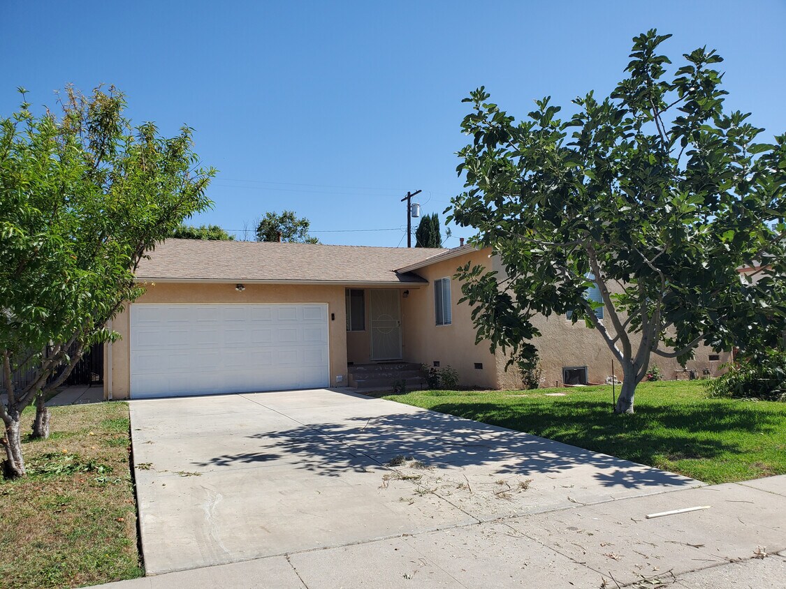 Front of home with 2-car attached garage - 17961 Lull St