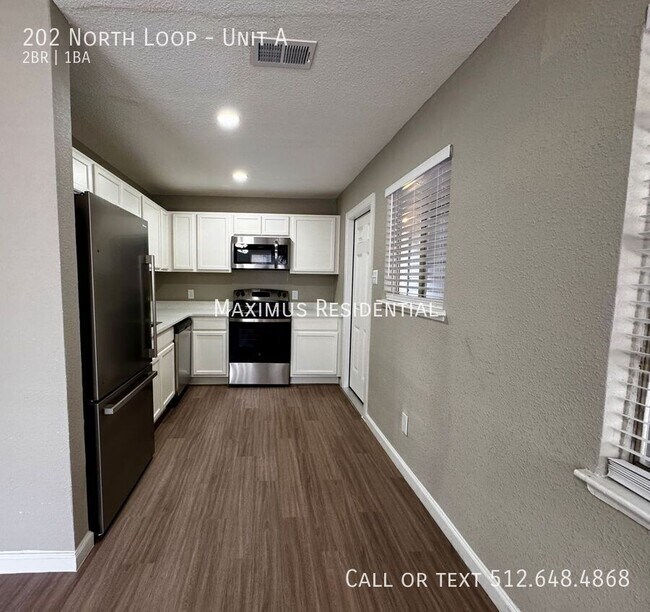 Foto del edificio - 202 W N Loop Blvd