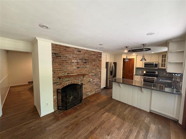 Foto del edificio - 6452 E Lovers Ln